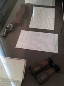 Stanley's writings, binoculars and gun